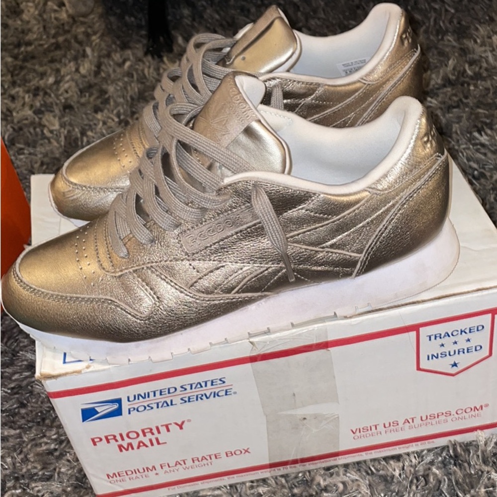 Reebok classic “metallic gold”